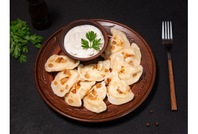 Potato pierogy with bacon crisps